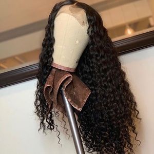 24” inch deep curly Cambodian hair. Bleached knots